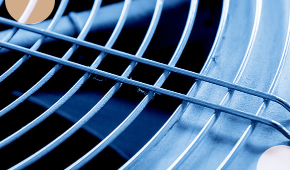 Close up image of the top of a piece of industrial HVAC equipment.